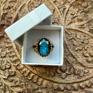Vintage style ring with oval blue CZ stone